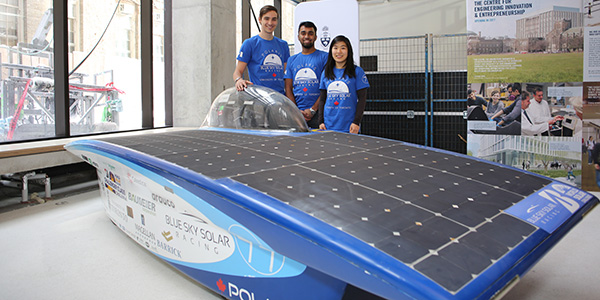 Members of U of T Engineering’s BLUE Sky Solar Racing team show off Polaris, the vehicle that placed 11th in the Challenger Class of the 2017 World Solar Challenge through the Australian Outback.