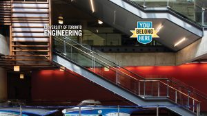 Image shows the interior of the Bahen Centre with the words UNIVERSITY OF TORONTO ENGINEERING and You Belong Here on the upper left and right corners.