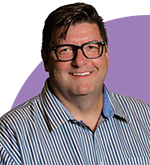 headshot of Gary Saarenvirta on purple semi-circle background